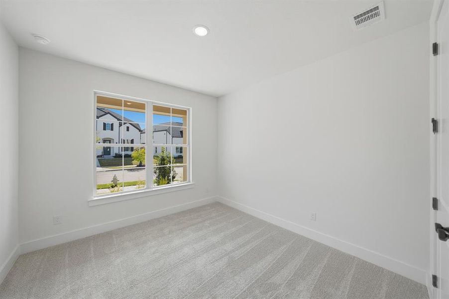 Unfurnished room with carpet floors and recessed lighting Unfurnished room with carpet floors and recessed lighting