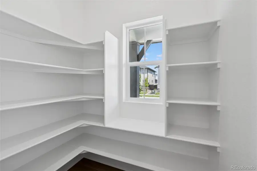 Spacious, unfurnished interior of a new home in Painted Prairie Cottage, Aurora (Image 34).