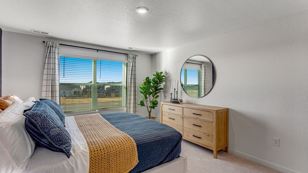 Furnished interior view inside a new home in The Ridge at Lorson Ranch, Colorado Springs (Image 10).
