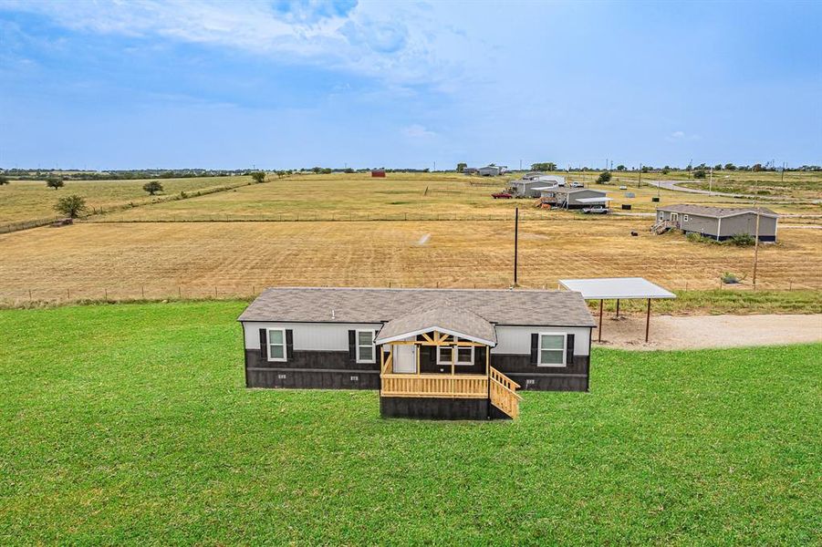 Front exterior of a new home in , Decatur, TX, highlighting curb appeal (Image 2). Front exterior of a new home in , Decatur, TX, highlighting curb appeal (Image 2).