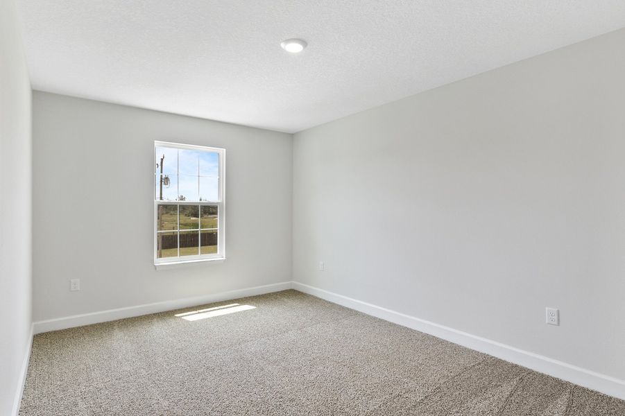 Representative unfurnished interior of a home built from the 2705 by Adams Homes in Winding Oaks, Weeki Wachee (Image 33).