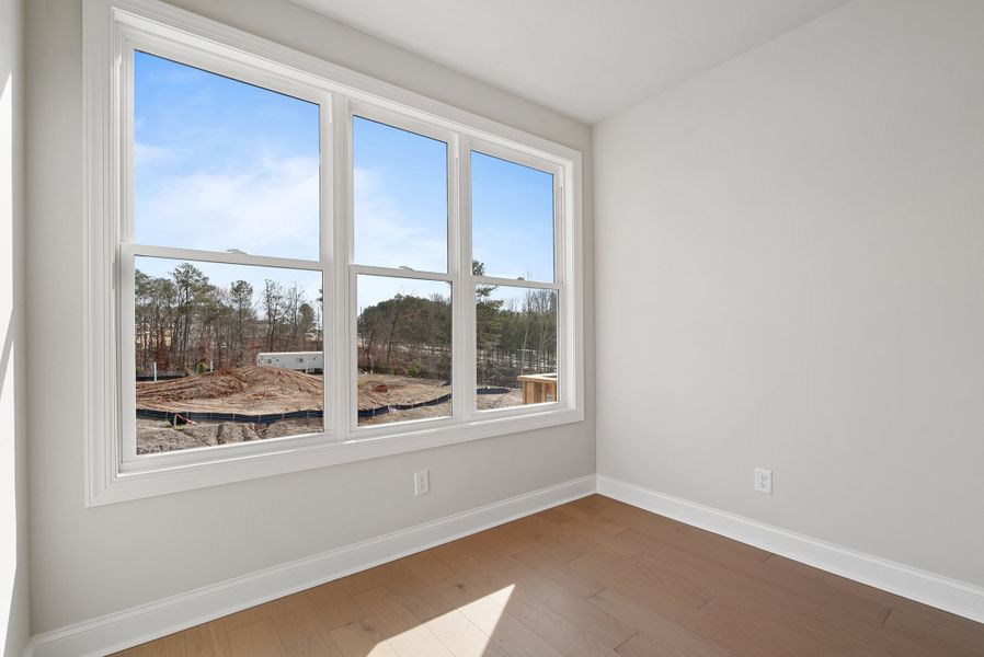 Representative unfurnished interior of a home built from the 
                        
                         by The Providence Group in Ward's Crossing Townhomes, Johns Creek (Image 32).