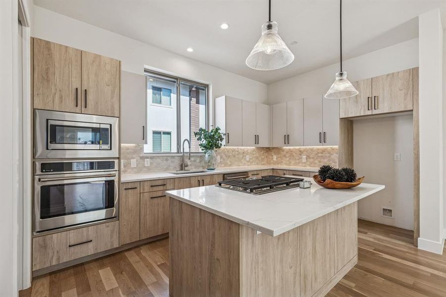 featuring quartz countertops, GE Cafe Series Appliance pkg, Visual Comfort light fixtures and real 3/4" solid hardwood floors