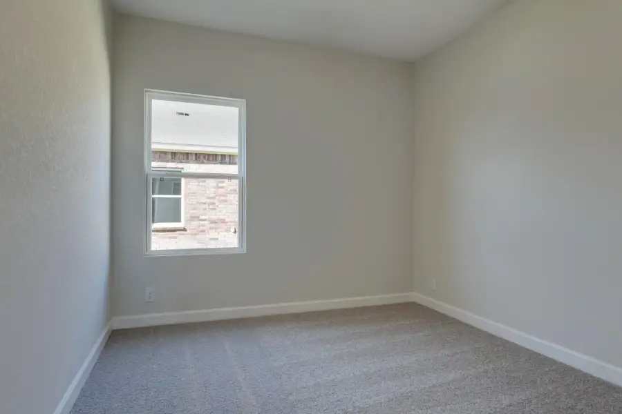 Representative unfurnished interior of a home built from the Brodie by Ashton Woods in Saddlebrook Ranch, Schertz (Image 16).