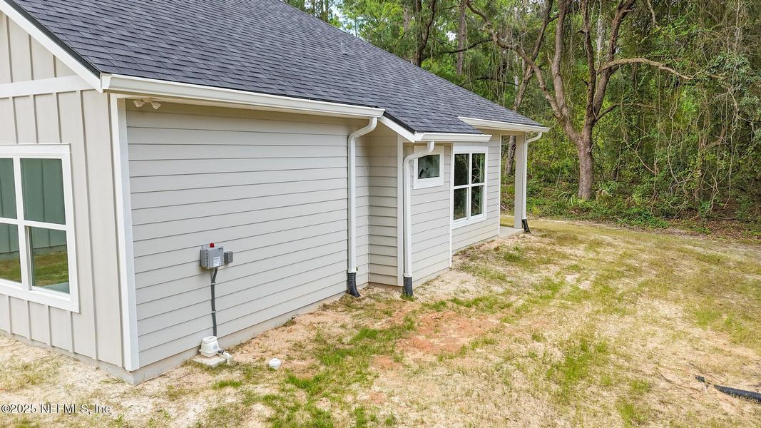 Front exterior of a new home in , Melrose, FL, highlighting curb appeal (Image 23).