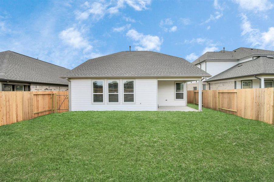 Come and see this spacious backyard with its beautiful covered patio. There is plenty of room for the kids to play and adults to relax. Perfect for your outdoor living space, patio furniture, bbq pit, and so much more. The possibilities are endless!