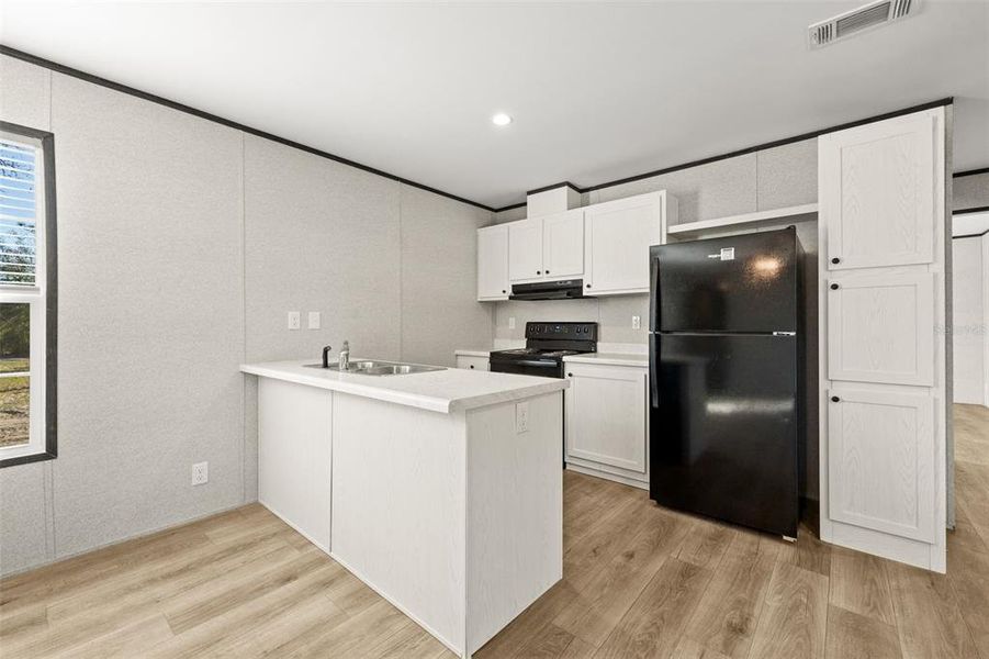 Furnished interior view inside a new home in , Bronson (Image 5).