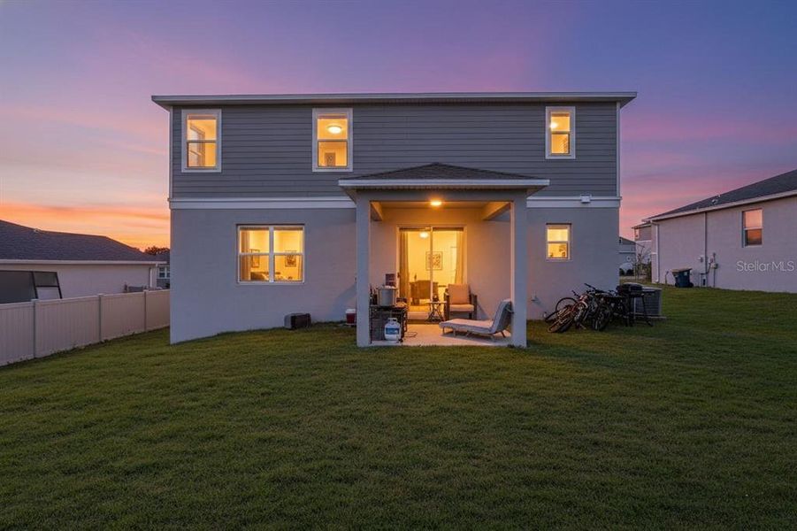 Exterior details and patio area of a home in The Reserve at Lake Ridge, Minneola (Image 27).