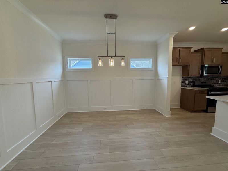 Spacious, unfurnished interior of a new home in Cottages at Roofs Pond, West Columbia (Image 22).