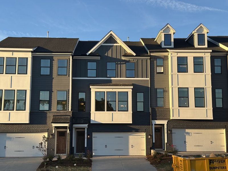 Front exterior of a new home in Sweetbrier, Durham, NC, highlighting curb appeal (Image 1).