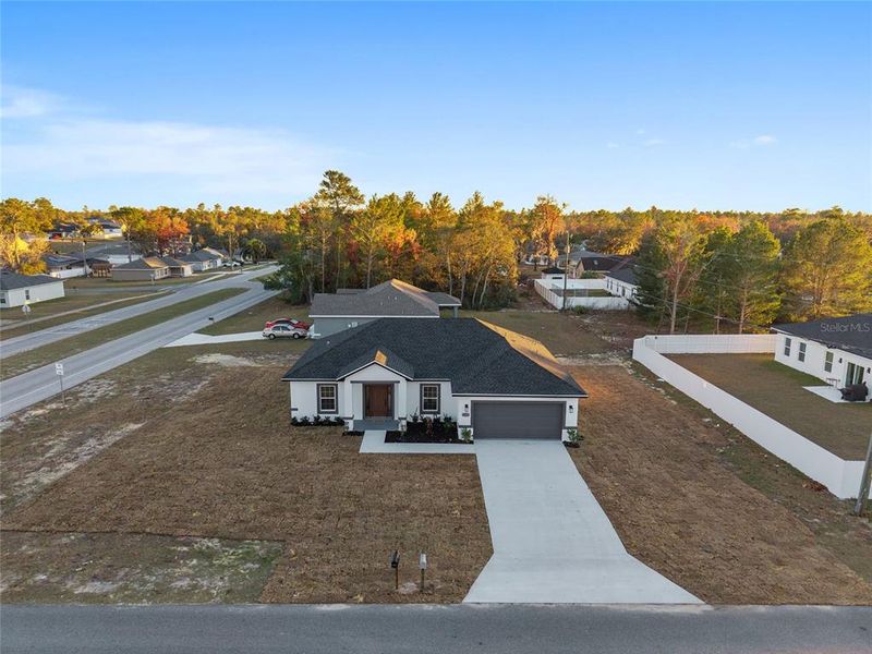 Front exterior of a new home in , Ocala, FL, highlighting curb appeal (Image 28).