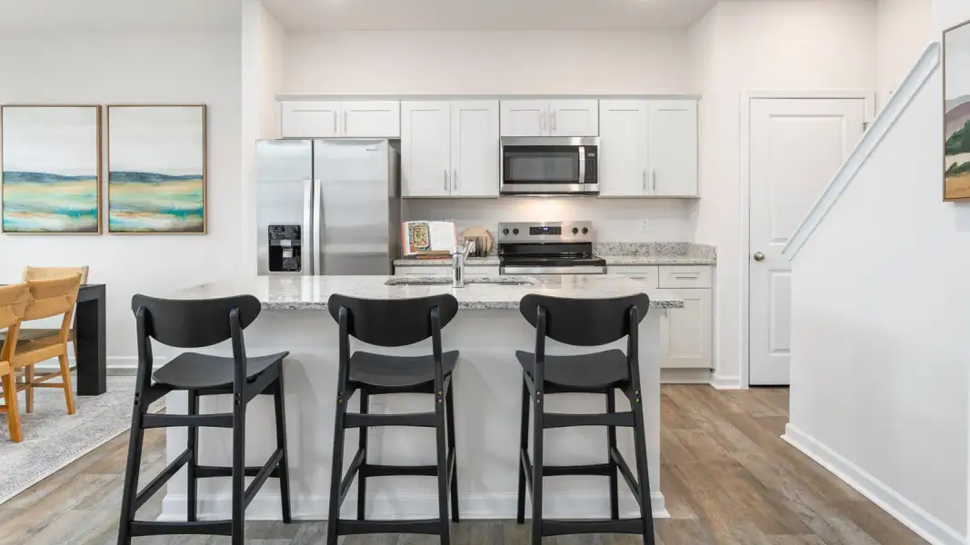 Furnished interior view inside a new home in North Village Townes, Greensboro (Image 11).