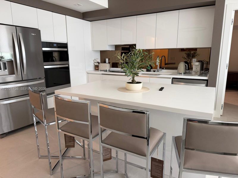 Furnished interior view inside a new home in , Hallandale Beach (Image 9).