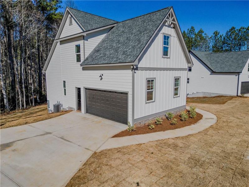Front exterior of a new home in , Villa Rica, GA, highlighting curb appeal (Image 20). Front exterior of a new home in , Villa Rica, GA, highlighting curb appeal (Image 20).