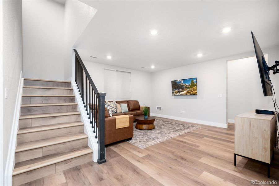 Finished basement with 10-ft ceilings.