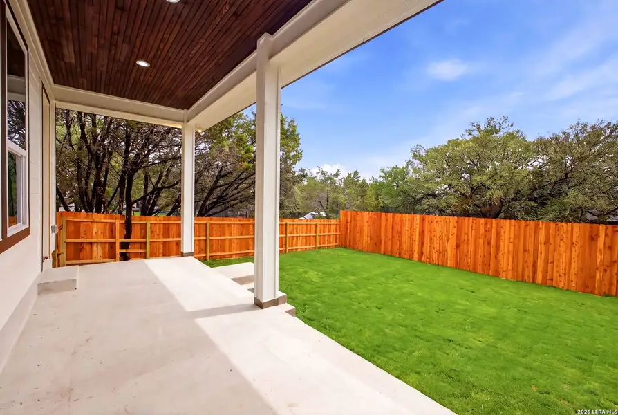 Exterior details and patio area of a home in , Spring Branch (Image 4).