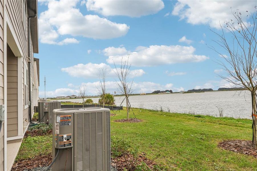 Exterior details and patio area of a home in Catamaran Cove Townhomes, Rockledge (Image 22).