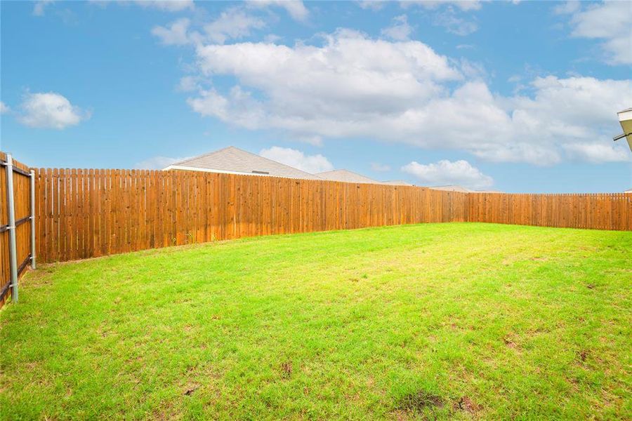 Exterior details and patio area of a home in Tillage Farms, Princeton (Image 24).