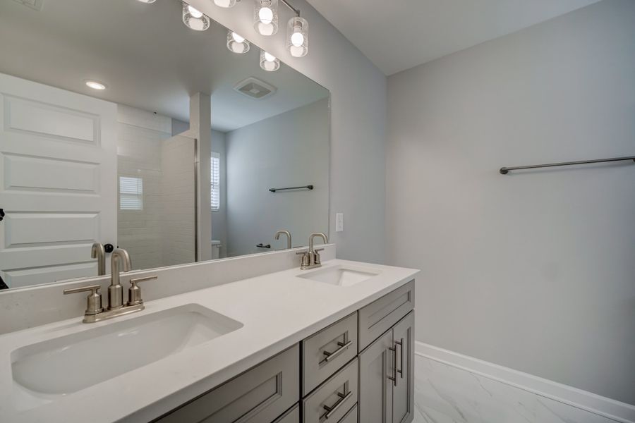 Representative furnished interior of a home built from the Draper by Parkside Builders in The Woods, Gallatin (Image 12).