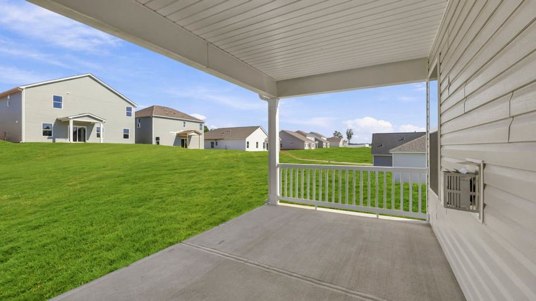 Exterior details and patio area of a home in Blue Ridge Trail, Fountain Inn (Image 19).