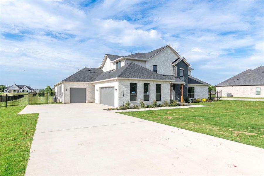 Front exterior of a new home in , Weston, TX, highlighting curb appeal (Image 2). Front exterior of a new home in , Weston, TX, highlighting curb appeal (Image 2).
