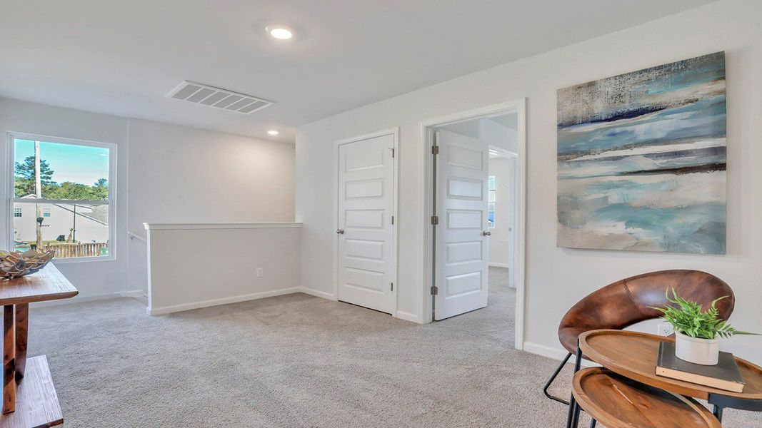 Furnished interior view inside a new home in The Groves at Bees Creek, Ridgeland (Image 14).