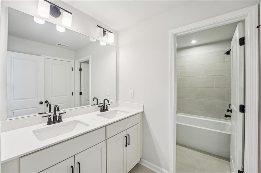 Furnished interior view inside a new home in Tiberon Woods, Cumming (Image 21). Furnished interior view inside a new home in Tiberon Woods, Cumming (Image 21).