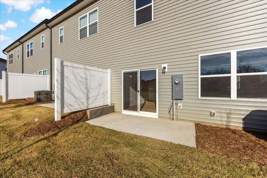 Exterior details and patio area of a home in Fifteen 15 Cannon, Charlotte (Image 4).