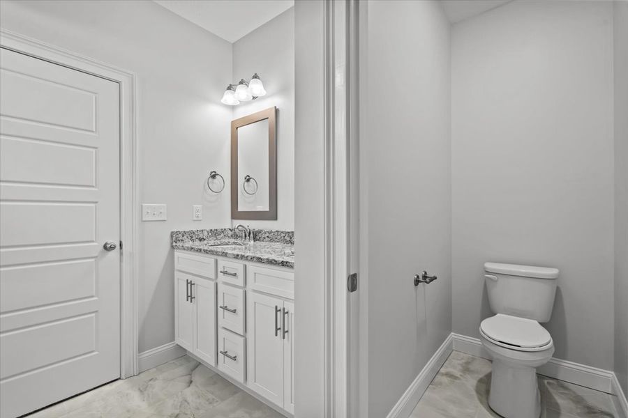 Representative furnished interior of a home built from the Roosevelt by Enchanted Homes in Guadalupe Heights, Seguin (Image 11).