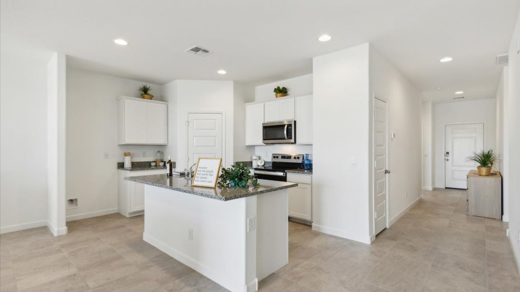 Representative furnished interior of a home built from the Justin by D.R. Horton in Sorrento, Maricopa (Image 6).