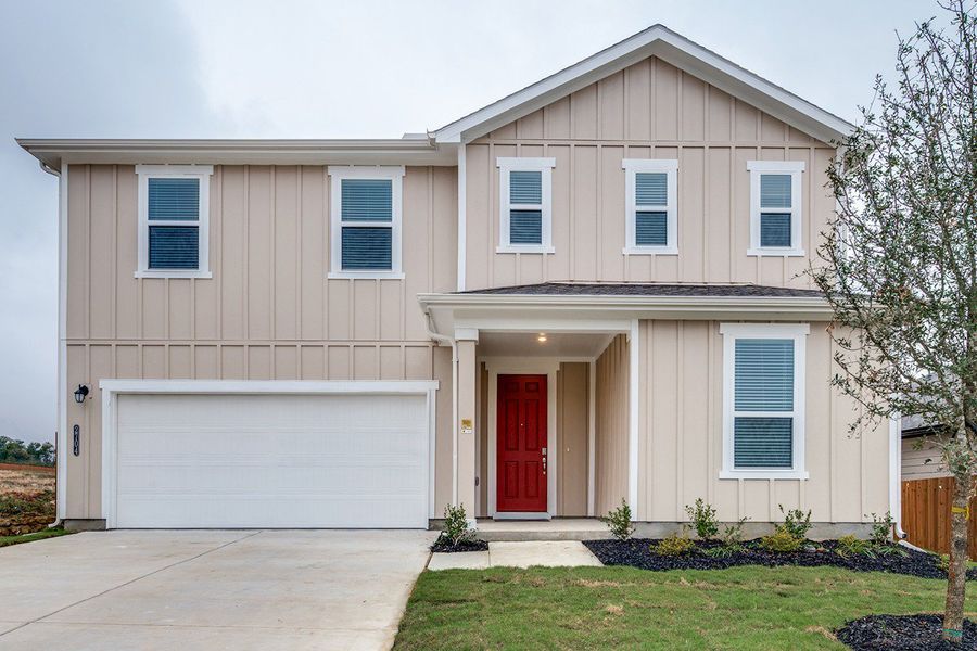 Front exterior of a new home in Eagle Creek, Denton, TX, highlighting curb appeal (Image 1). Front exterior of a new home in Eagle Creek, Denton, TX, highlighting curb appeal (Image 1).