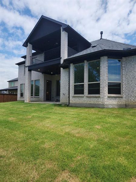 Front exterior of a new home in Inspiration, Lucas, TX, highlighting curb appeal (Image 19). Front exterior of a new home in Inspiration, Lucas, TX, highlighting curb appeal (Image 19).