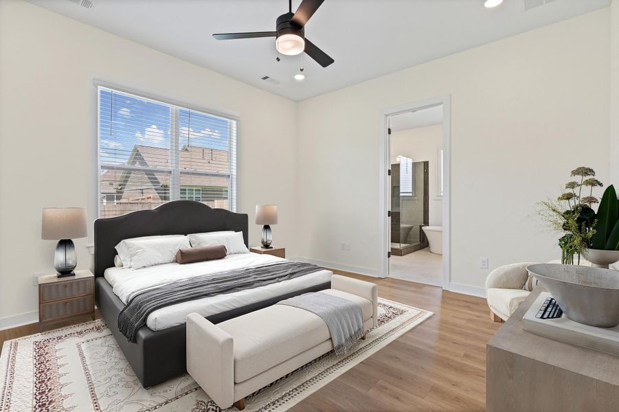 Spacious room featuring wood-finish flooring, recessed lighting, and a ceiling fan Spacious room featuring wood-finish flooring, recessed lighting, and a ceiling fan