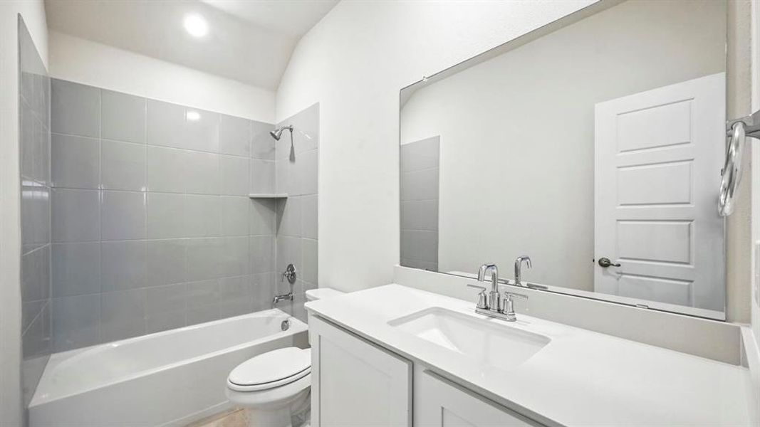 Full bathroom featuring shower / washtub combination and vanity