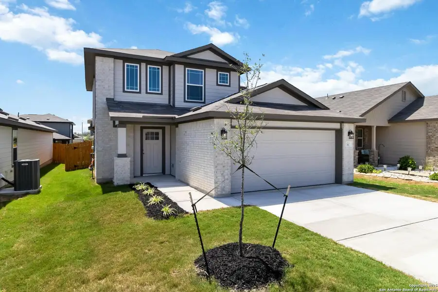 Front exterior of a new home in Willow Point, San Antonio, TX, highlighting curb appeal (Image 1). Front exterior of a new home in Willow Point, San Antonio, TX, highlighting curb appeal (Image 1).