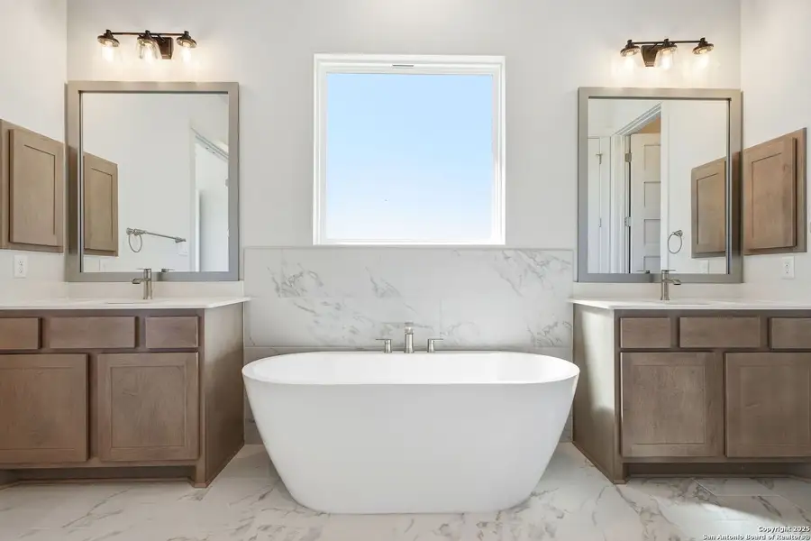 Furnished interior view inside a new home in Pradera Ridge, Floresville (Image 11).