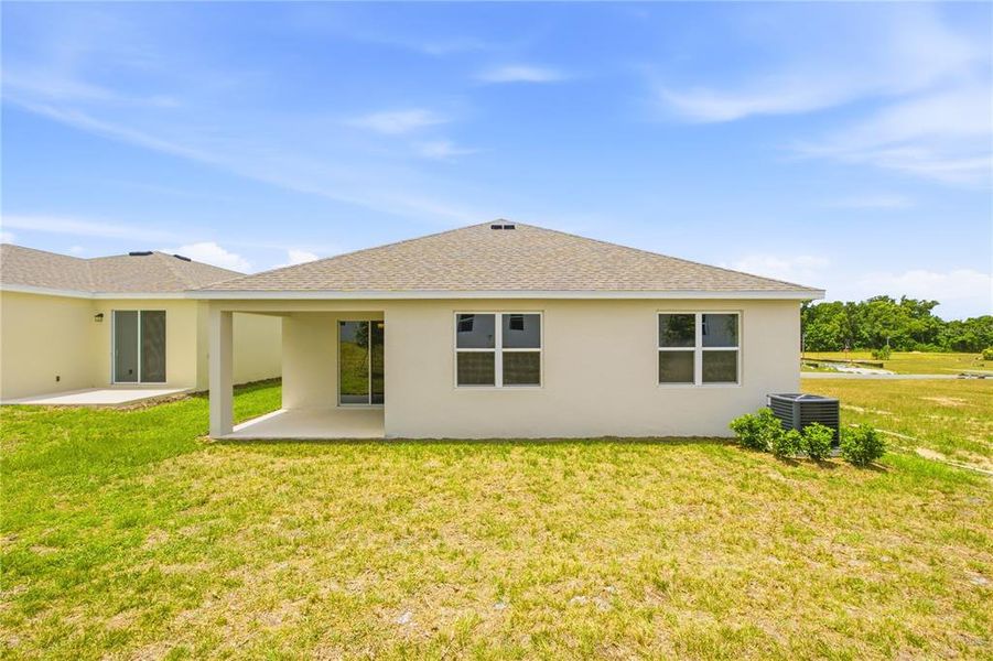 Exterior details and patio area of a home in , Okahumpka (Image 3).