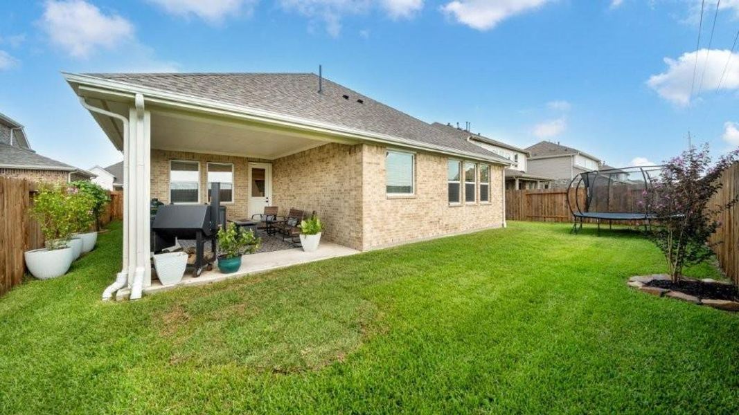 Front exterior of a new home in , League City, TX, highlighting curb appeal (Image 2).