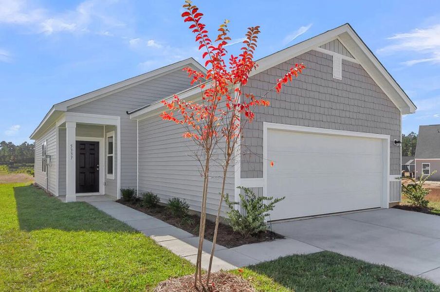 Front exterior of a new home in Watson Hill, Summerville, SC, highlighting curb appeal (Image 1). Front exterior of a new home in Watson Hill, Summerville, SC, highlighting curb appeal (Image 1).