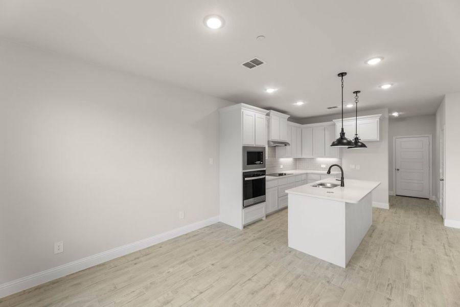 Front exterior of a new home in Main Street Village, Mansfield, TX, highlighting curb appeal (Image 9). Front exterior of a new home in Main Street Village, Mansfield, TX, highlighting curb appeal (Image 9).