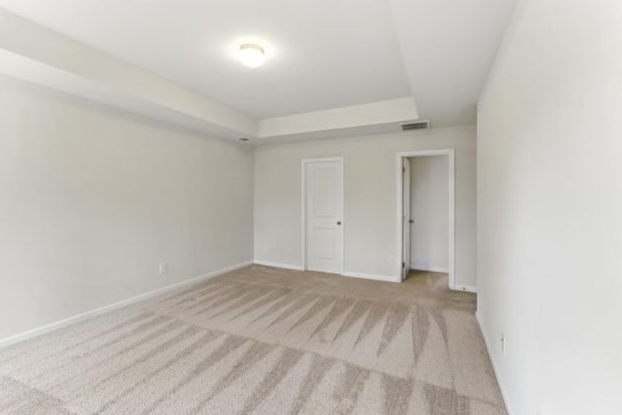 Representative unfurnished interior of a home built from the Brentwood by Piedmont Residential in Falls Creek, Flowery Branch (Image 35).