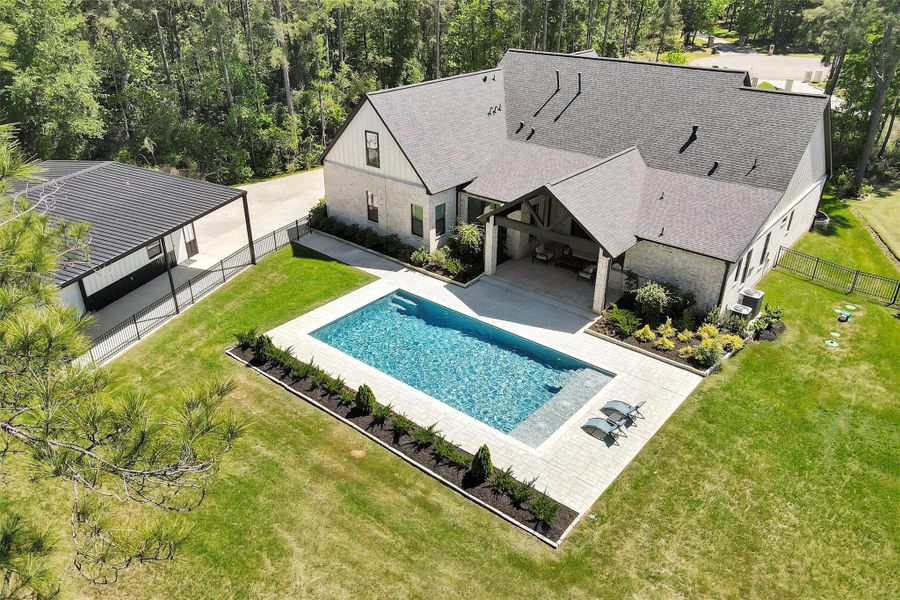 Luxurious pool and back patio.