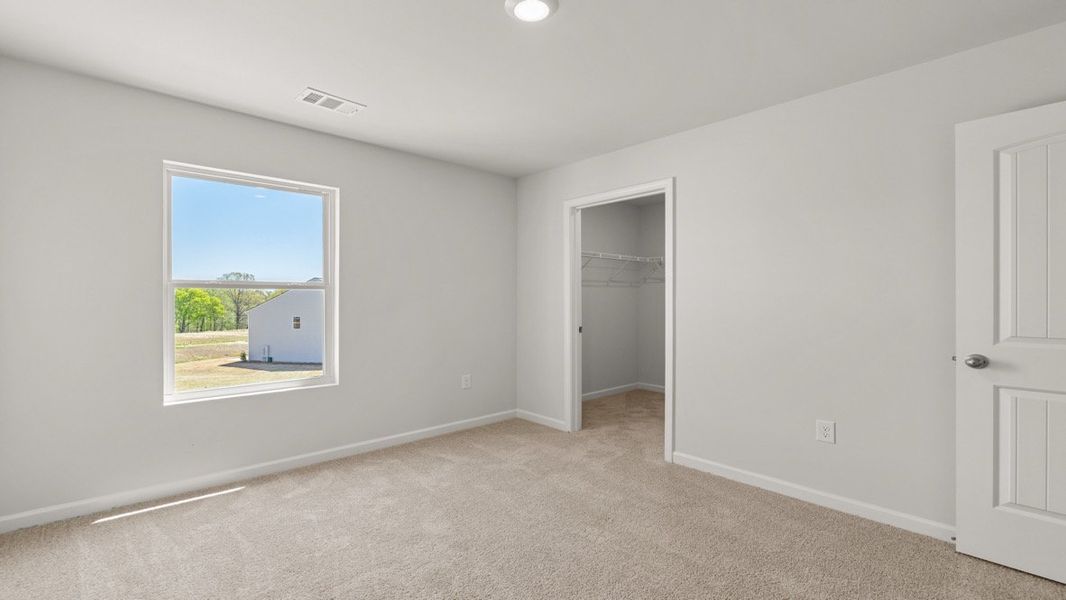 Representative unfurnished interior of a home built from the Aisle by D.R. Horton in Rolling Meadows, Jasper (Image 24).