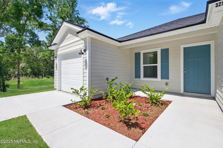 Exterior details and patio area of a home in , Satsuma (Image 3).
