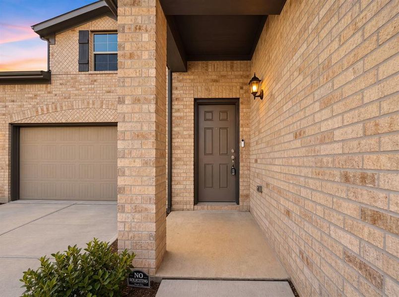 Exterior details and patio area of a home in Sagebrook, Denton (Image 4).