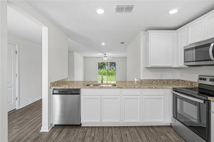 Furnished interior view inside a new home in Poinciana, Poinciana (Image 5).