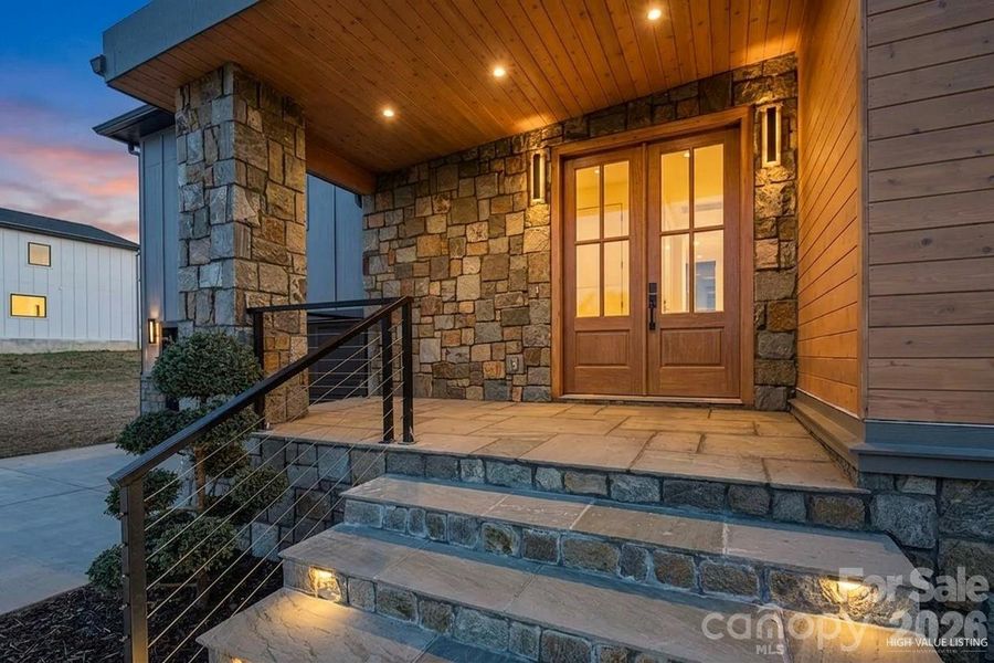 Exterior details and patio area of a home in , Flat Rock (Image 30).