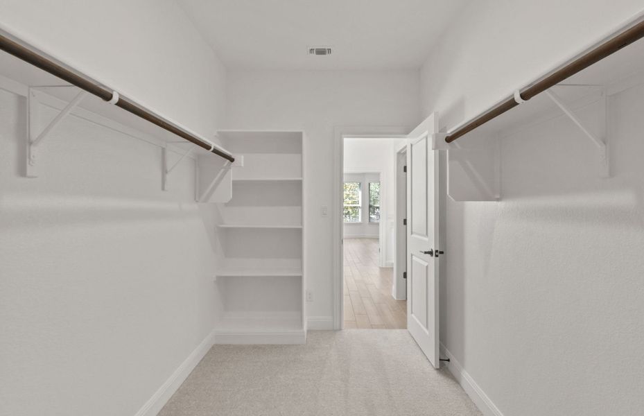 Representative unfurnished interior of a home built from the Wallace by Pulte Homes in Bluffview Reserve, Leander (Image 24).