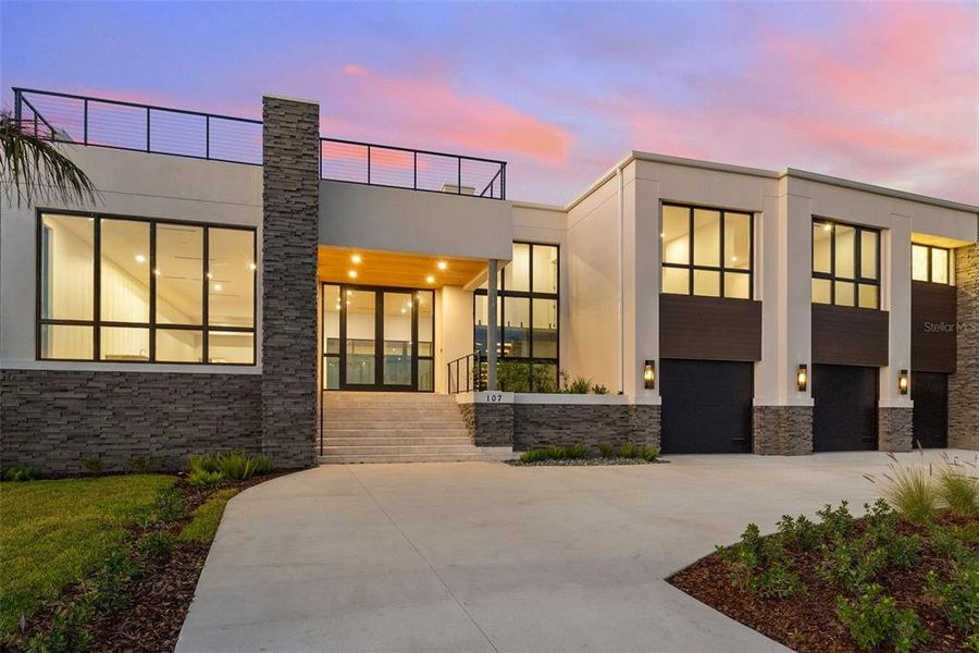 Front exterior of a new home in , Tampa, FL, highlighting curb appeal (Image 23).