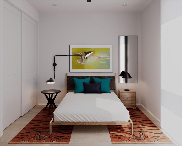 Bedroom with light wood-style flooring Bedroom with light wood-style flooring